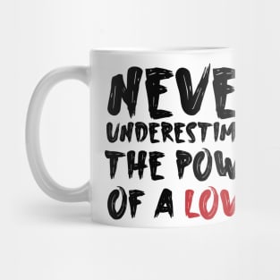 Never underestimate the power of a lover Mug